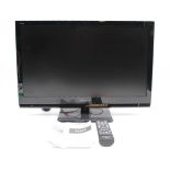 A Panasonic TX-L24X5B 24" TV, with remote and instructions