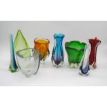 A collection of eight art glass vases, including a Murano Sommerso ribbed blue vase, a red Vertrarti