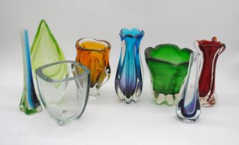 A collection of eight art glass vases, including a Murano Sommerso ribbed blue vase, a red Vertrarti