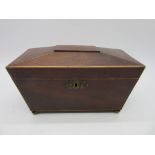 A mahogany sarcophagus shaped tea caddy with boxwood stringing