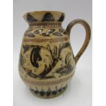 A Doulton Lambeth incised jug designed by Arthur Barlow, height 27cm