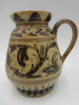 A Doulton Lambeth incised jug designed by Arthur Barlow, height 27cm