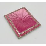 A hallmarked silver cigarette case with pink guilloche enamel decoration- some damage to enamel