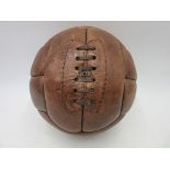 A vintage brown leather football