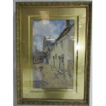 A gilt framed watercolour signed Hubert Coop of a town scene with a girl playing with a hoop, 49cm x