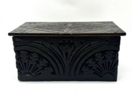 An antique oak carved box.