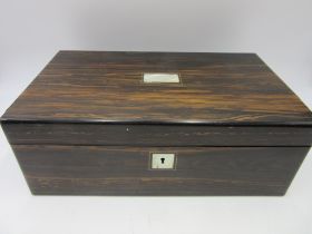 A Victorian coromandel writing slope with secret drawer