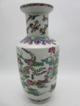 A large famille rose vase decorated with ducks, butterfly and exotic birds, six character mark to