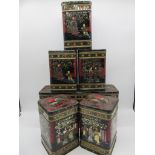 A set of eight tin tea cannisters with Japanese decoration, height 25.5cm