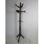 A Victorian style coat and hat stand, height 190cm