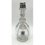 A Humphrey Taylor of London four division glass decanter each side named 'Pricota Apricot