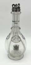 A Humphrey Taylor of London four division glass decanter each side named 'Pricota Apricot