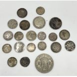 A collection of various silver coinage including James I half groat, George III shilling etc.