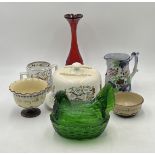 An assortment of ceramics including Torquay ware, a glass chicken egg crock, Swedish art glass, a