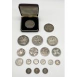 A collection of silver Georgian and Victorian coinage including gothic florins, four pence pieces,