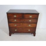 A Georgian mahogany chest of five drawers, raised on bracket feet - length 109.5cm, depth 53cm,