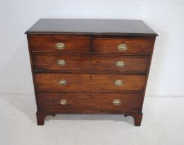 A Georgian mahogany chest of five drawers, raised on bracket feet - length 109.5cm, depth 53cm,