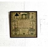 An antique sampler decorated with trees, flowers, plants and religious verse, by Adelaide Augusta