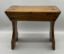 A rustic wooden stool