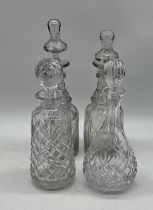 Four cut glass decanters