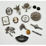 A collection of silver jewellery including brooches, pendant etc.