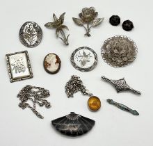 A collection of silver jewellery including brooches, pendant etc.