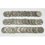 A collection of approximately 37 silver and part silver two shillings/florins etc.