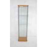 A lockable glass display cabinet, with three shelves and key - length 42.5cm, depth 36.5cm, height