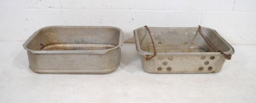 Two galvanised seed trays, one marked 'J Manson'