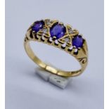 A 9ct gold amethyst ring with diamond insets