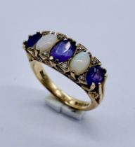 A 9ct gold amethyst and opal 5 stone ring