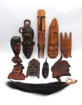 A collection of tribal carvings and masks, including some from Malawi, Ethiopia, Swaziland,