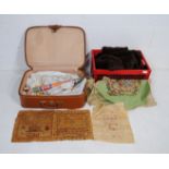 A quantity of various vintage textiles and clothing, including three needlework samplers, a quantity