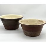 Two antique terracotta glazed dairy bowls