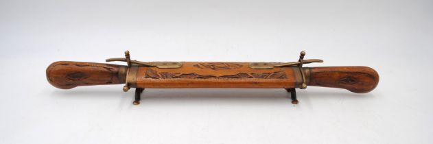 An Indian carving set, in a carved wooden case with the blades marked 'India'
