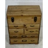 A small modern pine chest of six drawers plus one compartment. 42cm x 26cm, height 50cm