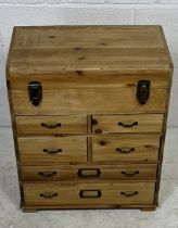 A small modern pine chest of six drawers plus one compartment. 42cm x 26cm, height 50cm