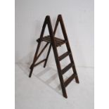 A vintage wooden folding step ladder - height 110cm