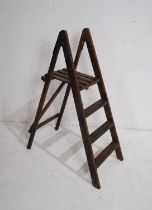 A vintage wooden folding step ladder - height 110cm