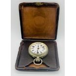 A Goliath pocket watch with alarm in travel case along with a continental silver fob watch and a