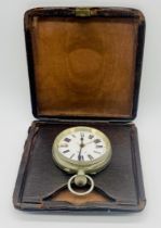 A Goliath pocket watch with alarm in travel case along with a continental silver fob watch and a