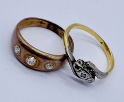 An unmarked 18ct gold ring (1 stone missing, total weight 2g) along with an unmarked 9ct gold ring
