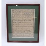 A framed Victorian needlework sampler, dated 1867 - 32cm x 38cm