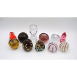 A small collection of art glass paperweights, including Mdina, Murano, Dartington, Wedgwood, Odessa,