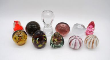 A small collection of art glass paperweights, including Mdina, Murano, Dartington, Wedgwood, Odessa,