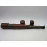 A Broadhurst Clarkson & Co. four draw telescope with leather case