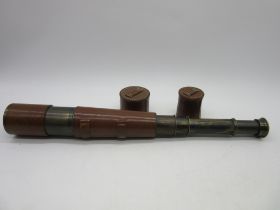 A Broadhurst Clarkson & Co. four draw telescope with leather case