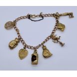 A 9ct gold charm bracelet with a collection of charms attached, total weight 15g