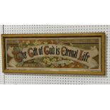 A framed religious quote from Romans VI. V23." The gift of God is eternal life" Overall size 38cm