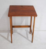 A vintage folding wooden school desk - length 56cm, depth 51cm, height 76cm